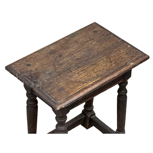 54 - A Late 17th Century Charles II oak joint stool. Circa 1670-1680. 39x26x43cm