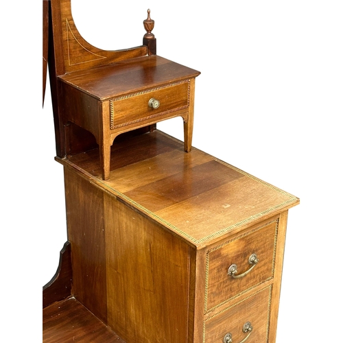 833 - A large Edwardian inlaid mahogany dressing table. 122x58x200cm