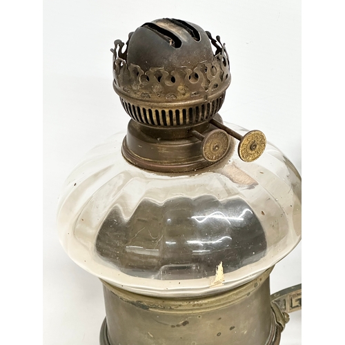 461 - A Late 19th Century Victorian wall hanging oil lamp. In the aesthetic movement. 23x32cm