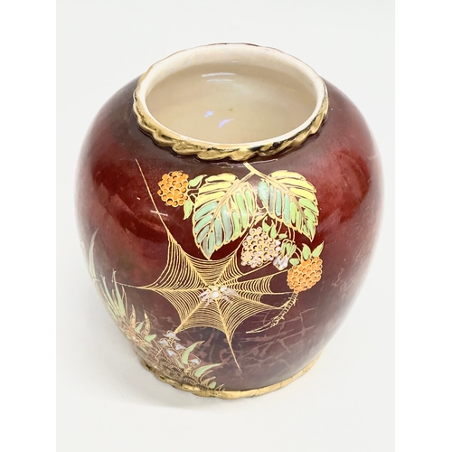 464 - A Carlton Ware “Rouge Royale” hand painted pot. With Spiders and Butterfly decoration. 11x12cm.