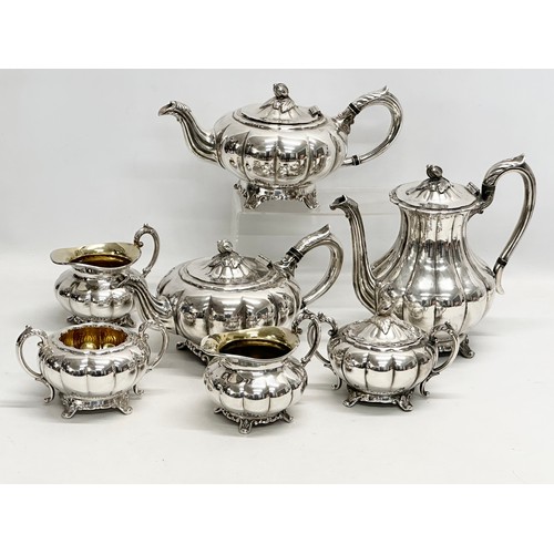 988 - A 7 piece Georgian style silver plated tea service.