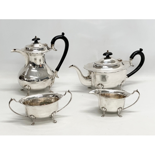 989 - A 4 piece Georgian style silver plated tea service.