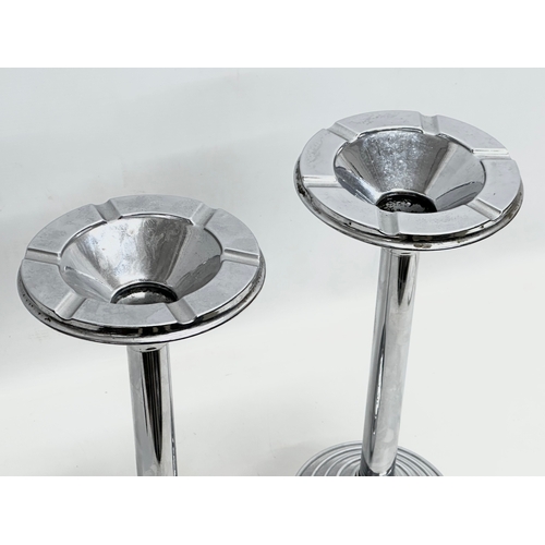 470 - A pair of Art Deco chrome smokers stands. 41cm.