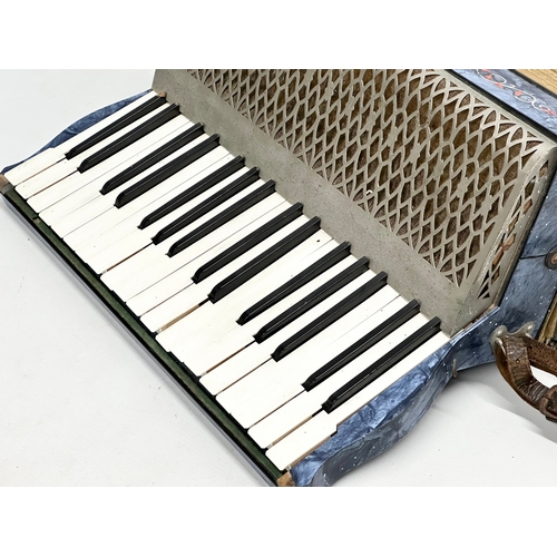 795 - A Hohner accordion.