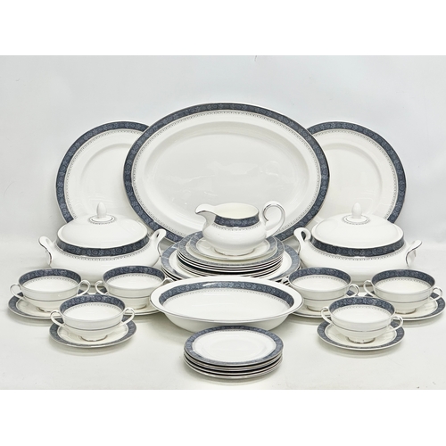 997 - A 36 piece Royal Doulton “Sherbrooke” dinner service. A platter. 6 dinner plates. 2 tureens. Serving... 