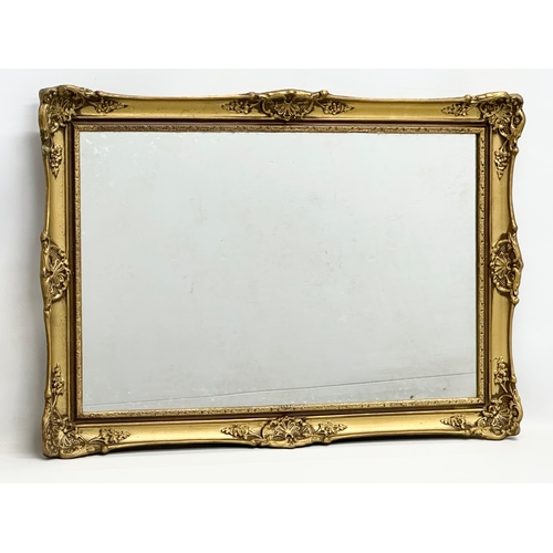 498 - A vintage Victorian style gilt framed mirror. 80x57cm