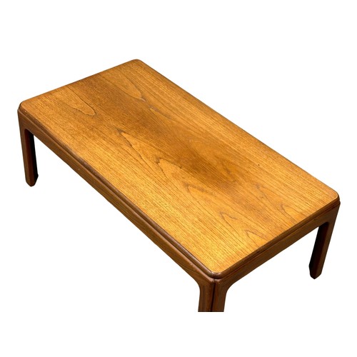 505 - A G-Plan Mid Century teak coffee table. Designed by Lesley Dandy. 107x56x38cm