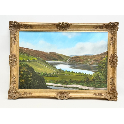 995 - Patrick Walsh. A large oil on canvas. County Wicklow Lough. 76x51cm. Gilt frame 90x64cm.