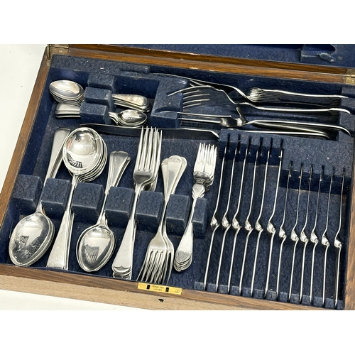 906A - A large canteen of cutlery. 43x33x8cm