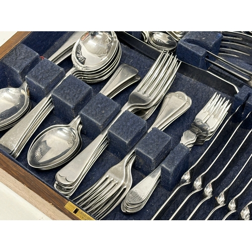 906A - A large canteen of cutlery. 43x33x8cm