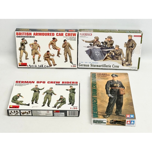 769 - 4 unused model kits. A MiniArt German SPG Crew Riders. A MiniArt British Armoured Car Crew. A Dragon... 