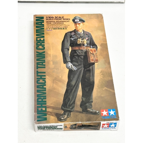 769 - 4 unused model kits. A MiniArt German SPG Crew Riders. A MiniArt British Armoured Car Crew. A Dragon... 