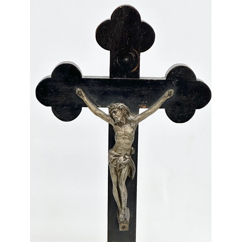 850 - A Late 19th/Early 20th Century crucifix and other. 31cm.