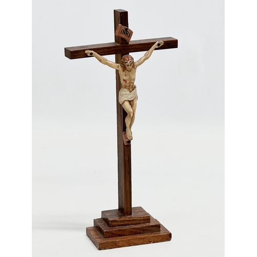 850 - A Late 19th/Early 20th Century crucifix and other. 31cm.