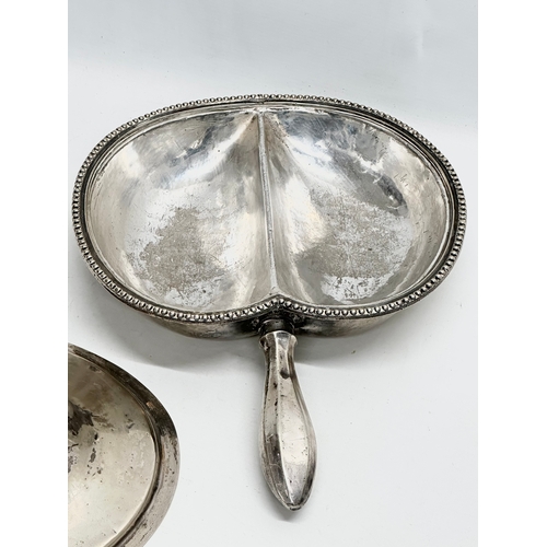 352A - A 19th Century silver plated entree dish. 29x38cm