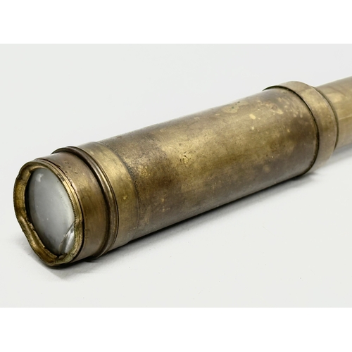 276A - A 19th Century brass telescope. Open 40cm.