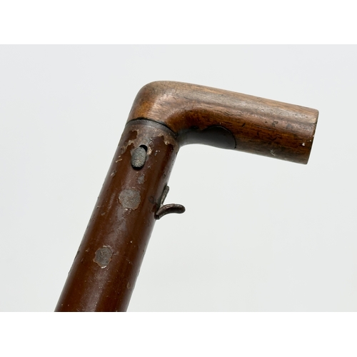 2 - A Late 19th/Early 20th Century cane gun/walking stick gun. 91cm