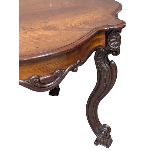 100A - A Mid 19th Century Victorian mahogany centre table on Cabriole legs and ornate frieze. Circa 1850-18... 