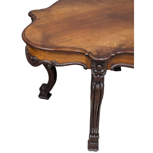 100A - A Mid 19th Century Victorian mahogany centre table on Cabriole legs and ornate frieze. Circa 1850-18... 