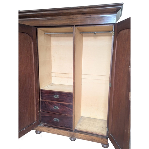 100B - A large Victorian mahogany 3 door wardrobe