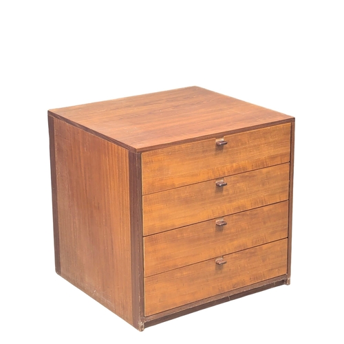 12 - A pair of Danish Mid Century teak chests of drawers with rosewood handles. 61x56x59cm