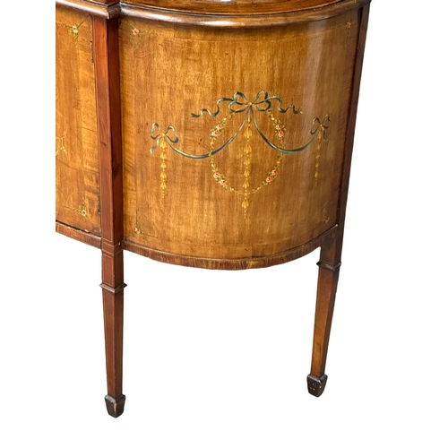 221 - A large Late 19th Century inlaid mahogany bow front display cabinet. In the 18th Century style. Circ... 