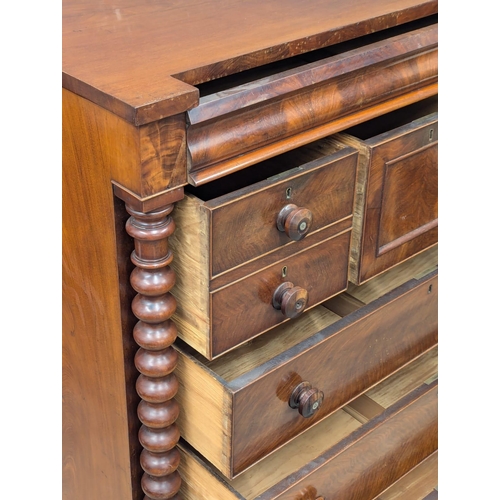 222 - A large Victorian mahogany chest of drawers with bobbin turn columns. Circa 1860-1870. 123x59x130.5c... 