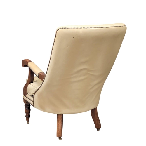 475 - A William IV style deep button back leather armchair.