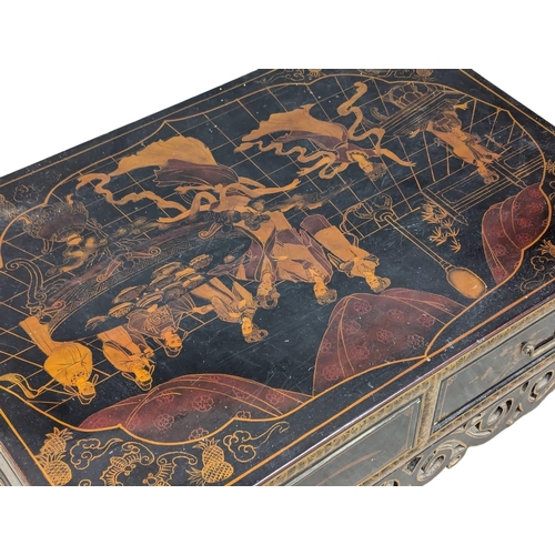 480 - A Japanese lacquered coffee table with 4 drawers. 91x60.5x47cm