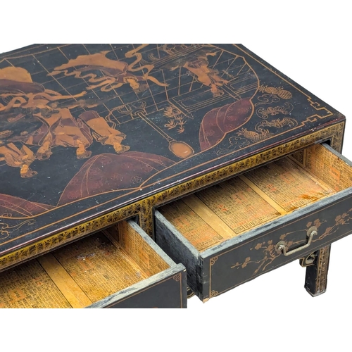 480 - A Japanese lacquered coffee table with 4 drawers. 91x60.5x47cm