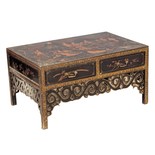 480 - A Japanese lacquered coffee table with 4 drawers. 91x60.5x47cm