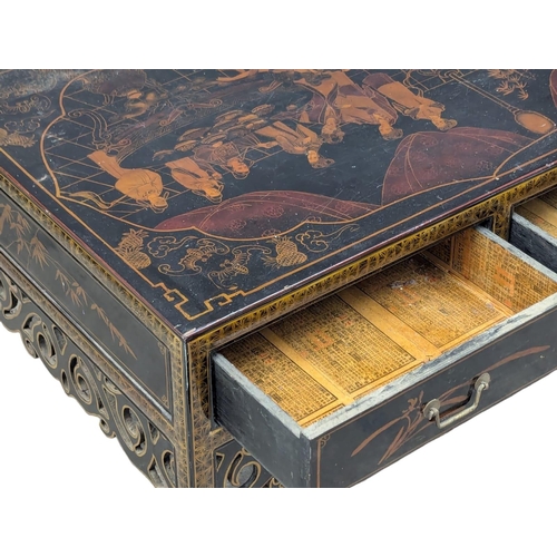 480 - A Japanese lacquered coffee table with 4 drawers. 91x60.5x47cm