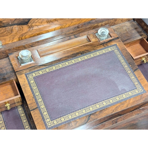 92 - A good quality Late 19th Century inlaid rosewood writing desk on square tapering legs. Inlaid with b... 