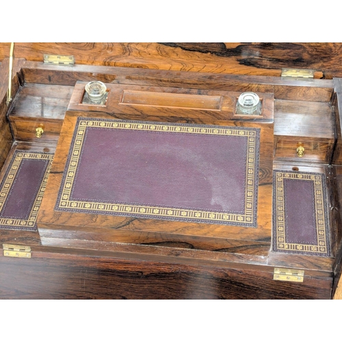 92 - A good quality Late 19th Century inlaid rosewood writing desk on square tapering legs. Inlaid with b... 