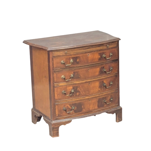 990 - A Late 19th Century George III mahogany bow front bachelor's chest of drawers. 77x46x75cm