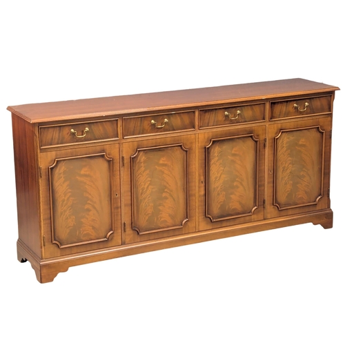 990A - A large Georgian style mahogany sideboard. 180x39x83.6cm