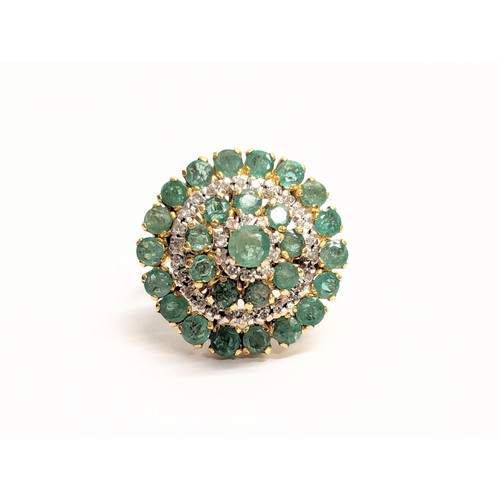 583A - An 18k gold diamond and emerald ring. Size UK L   (5)