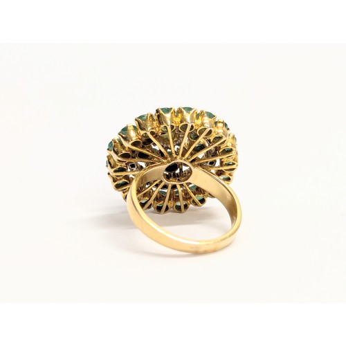 583A - An 18k gold diamond and emerald ring. Size UK L   (5)