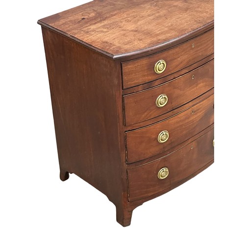 312 - A fine proportioned Mid 19th Century George III style mahogany bow front chest of drawers, on splaye... 