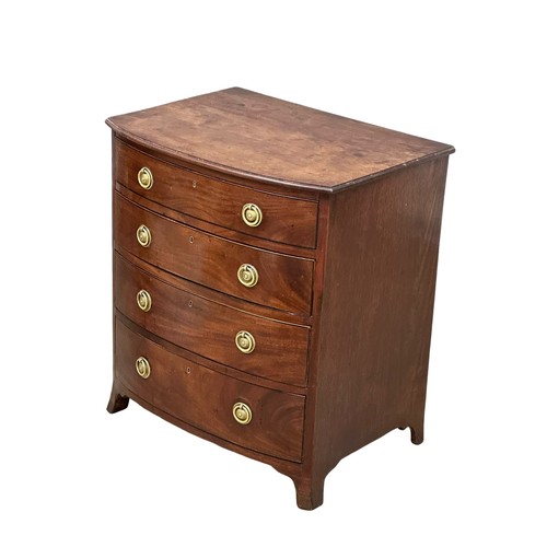 312 - A fine proportioned Mid 19th Century George III style mahogany bow front chest of drawers, on splaye... 