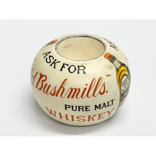 501 - An Early 20th Century Old Bushmills Whiskey advertising match holder/match striker. By Shelley.