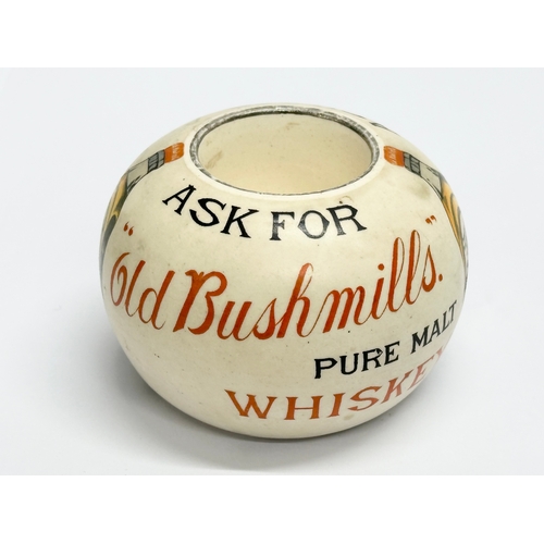 501 - An Early 20th Century Old Bushmills Whiskey advertising match holder/match striker. By Shelley.