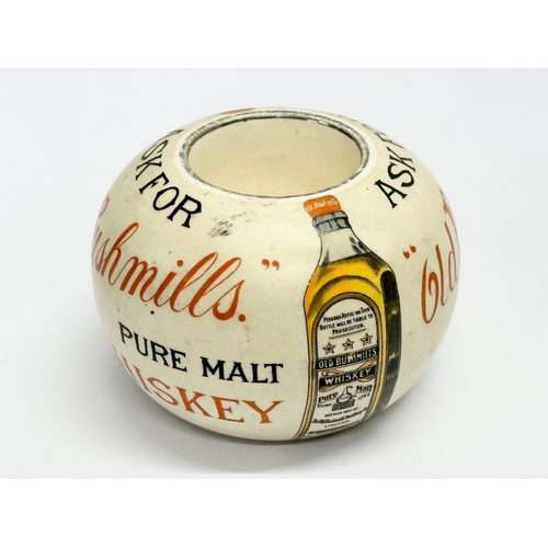 501 - An Early 20th Century Old Bushmills Whiskey advertising match holder/match striker. By Shelley.