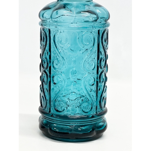 144 - An Italian Mid Century glass decanter. Empoli, Italy. In the manner of Wayne Husted. 32cm.