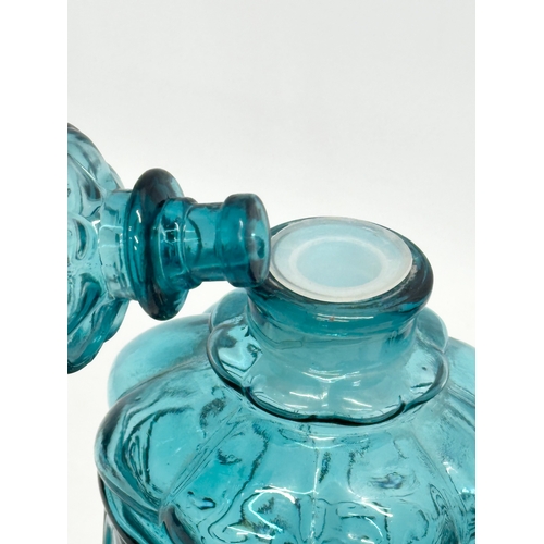 144 - An Italian Mid Century glass decanter. Empoli, Italy. In the manner of Wayne Husted. 32cm.