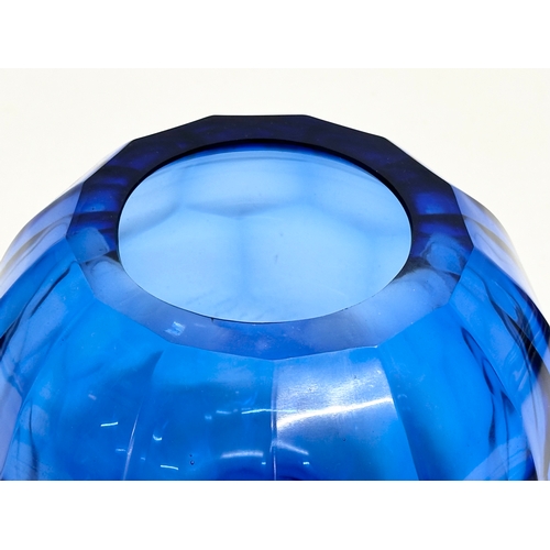 336 - A Bristol Blue glass bulbous vase. 19x17cm