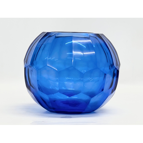 336 - A Bristol Blue glass bulbous vase. 19x17cm