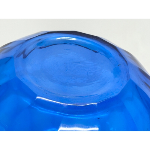 336 - A Bristol Blue glass bulbous vase. 19x17cm