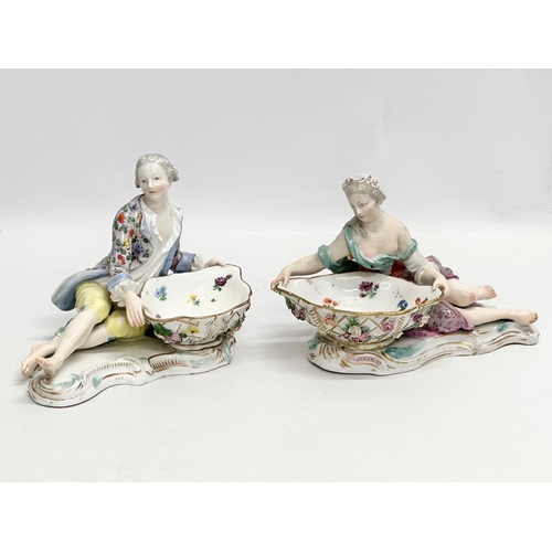 23 - A pair of large Late 19th Century Meissen figural table salts/sweet meat dishes. Modelled after J.J.... 