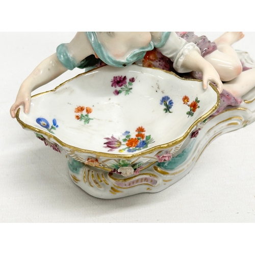 23 - A pair of large Late 19th Century Meissen figural table salts/sweet meat dishes. Modelled after J.J.... 